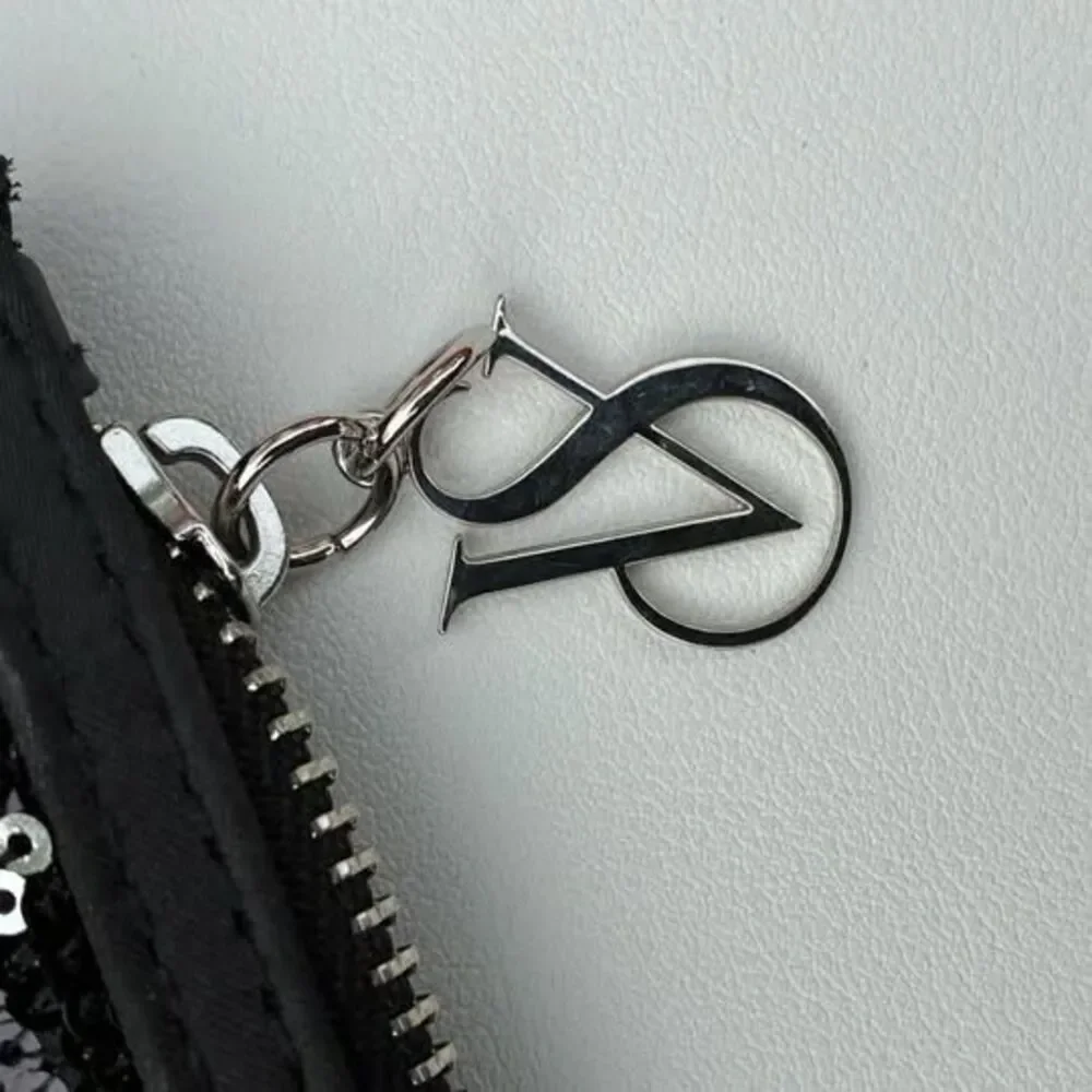 Victorias Secret pouch stains gold